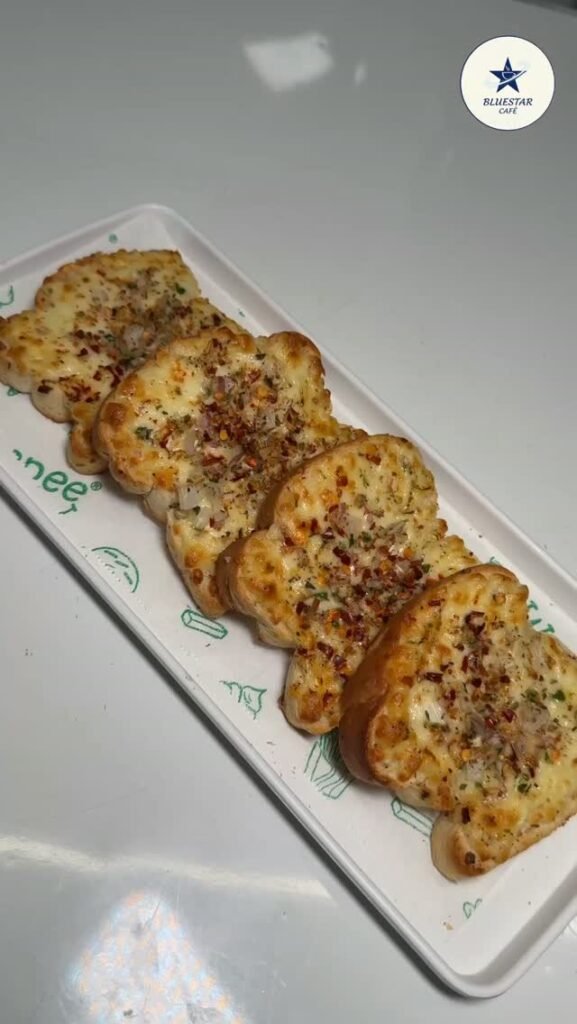 Cheese garlic bread slices at Bluestar Café
